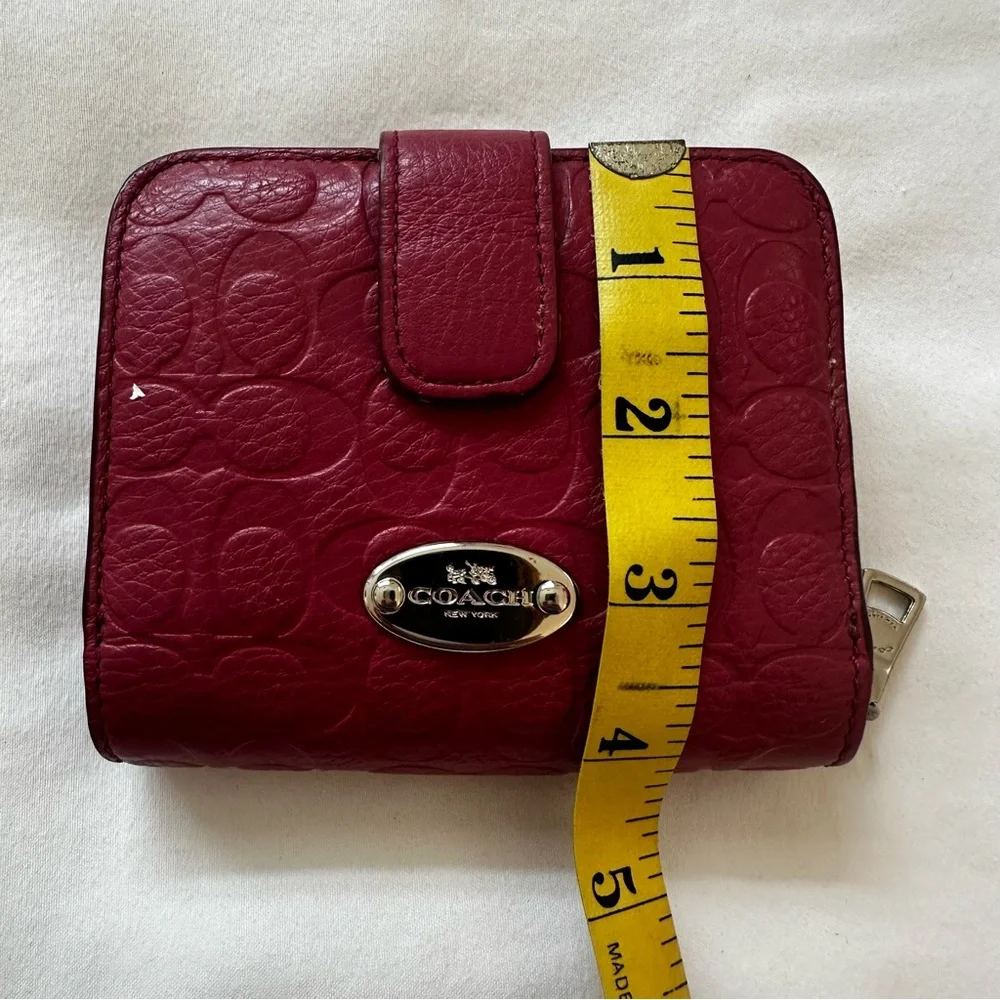 Coach Signature Embossed Pebble Leather Medium Zip Around Wallet in Sunset Red